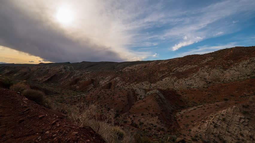 Time lapse of desert sun over wrinkled rock formation in Utah, USA