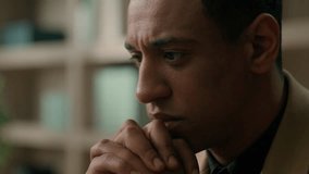 Close up thoughtful African American man confused puzzled businessman business employer leader thinking idea pensive think deep in thoughts ponder question dreaming search problem difficult solution - Powered by Shutterstock - Get 15% off with code: PIKWIZARD15