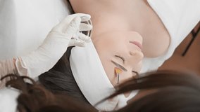 The video fragment will take you to the world of relaxation and harmony, where you enjoy facial skin peeling procedure, giving your skin freshness, youth and radiance in beauty clinic. Vertical video