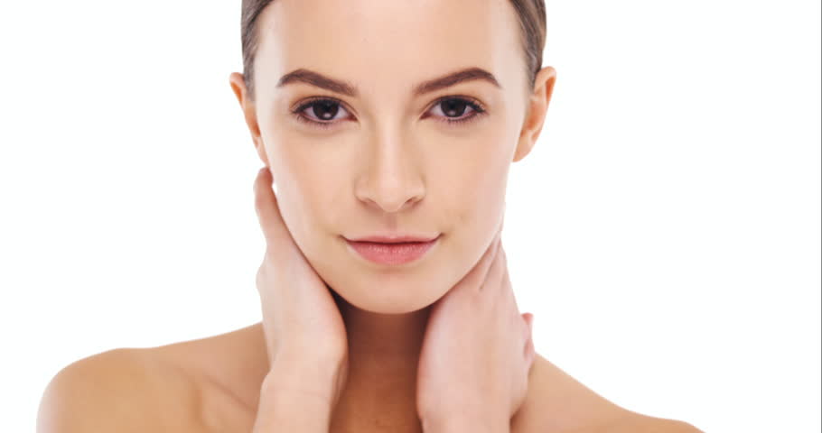Beauty, woman touching face and natural skincare treatment, dermatology and glow isolated on white background. Portrait, cosmetic care and female model with healthy and clean skin with mockup space | Shutterstock HD Video #1104599085