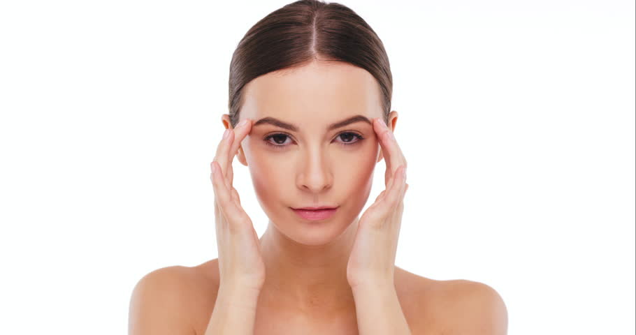Woman, beauty and skin, massage face with clean skincare and natural cosmetics, studio and white background. Female model touching facial for cosmetic care, dermatology with portrait and mockup space | Shutterstock HD Video #1104599123