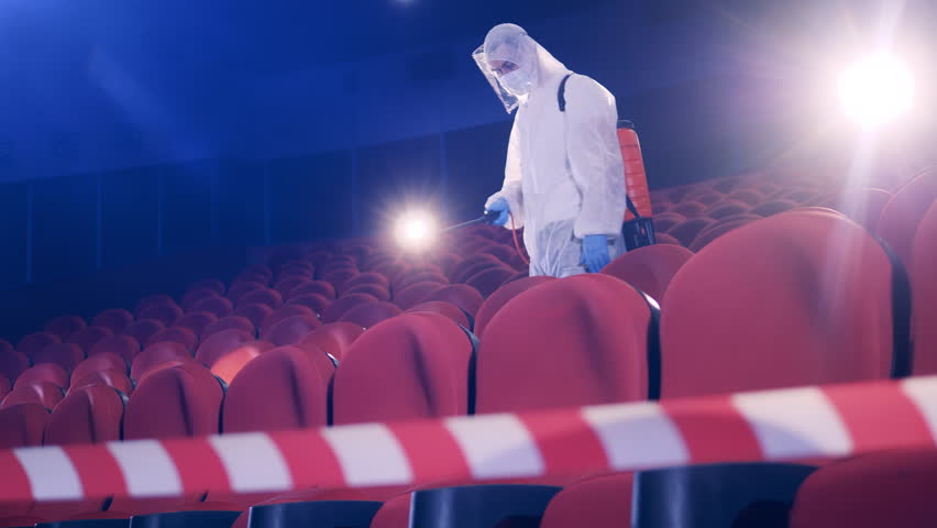 Cinema hall is getting disinfected by an inspector Royalty-Free Stock Footage #1104604277
