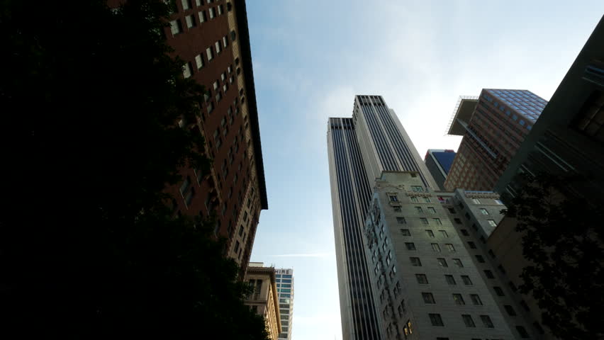 POV view of city skyline buildings. Los Angeles. High rise skyscrapers facades low angle. looking up moving shot of Los Angeles city modern skyscraper high-rises. Downtown Los Angeles, POV. 