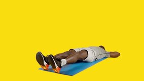 African man doing crunches alternating leg with bicycle