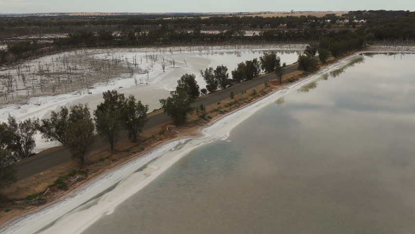 Pink Lakes in Australia. A road without cars.