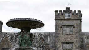 Castle and fountain video footage. Old ancient building and historic fountain with water