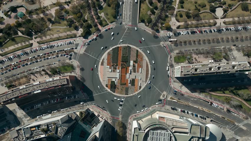 circle roundabout on automobile road with cars and vehicles, Valencia, aerial Royalty-Free Stock Footage #1104630535
