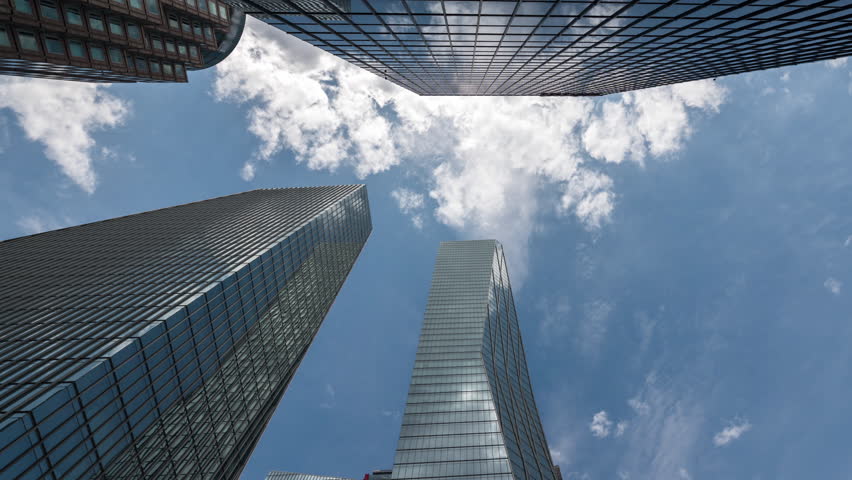 Time lapse Modern city architecture of Skyscrapper against sky at Seoul City. South korea.
