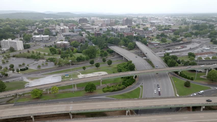 Huntsville, Alabama wide shot with freeway and drone video moving in.