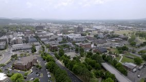 Huntsville, Alabama skyline with drone video moving left to right wide shot.