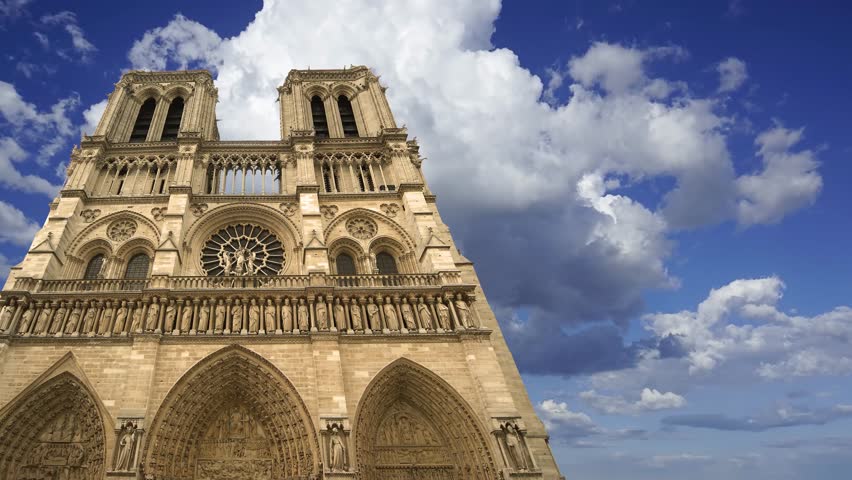 Notre Dame de Paris (against the moving clouds, 4K, time lapse), also known as Notre Dame Cathedral or simply Notre Dame, is a Gothic, Roman Catholic cathedral of Paris, France