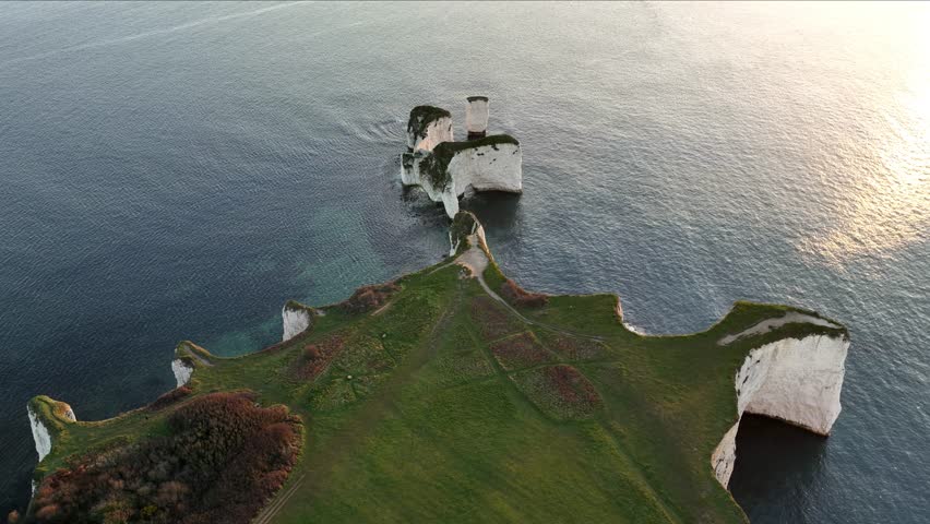 Sunrise at Old Harry Rocks near Studland, Dorset, aerial view.