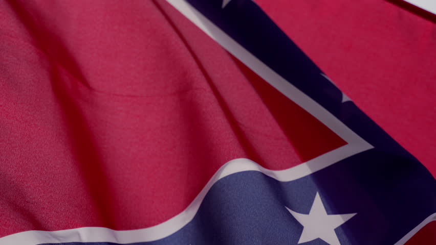 Civil-War themes: Confederate flag blowing in the wind. (4K Resolution - Slow-Motion)