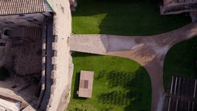 Top down aerial shot of a walkway into a large courtyard at a villa in Montpellier