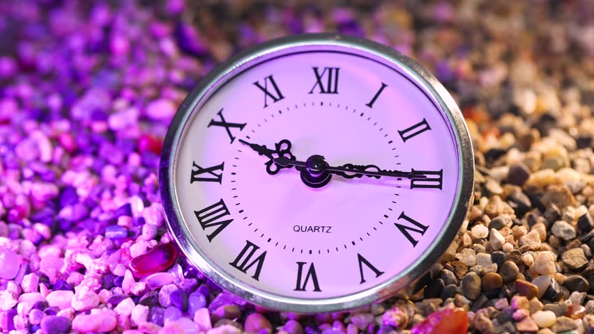 The hour hand on the dial is going round and round