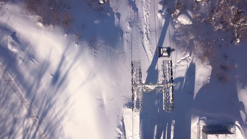 Aerial Top Down Shot of Gondola on Ski Hill in Chang Bai Shan, China