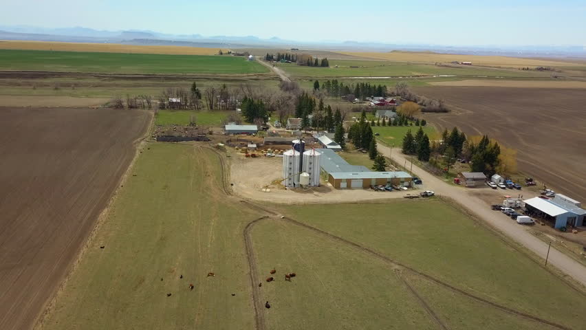 Aerial Panning Shot Of Lumber Industry And Ranch At Countryside During Sunny Day - Billings, Montana