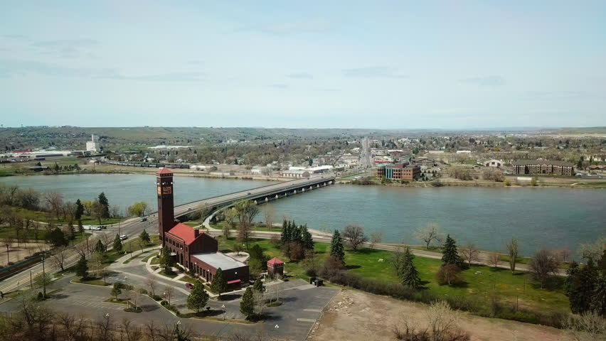 Aerial Shot Of Vehicles Moving On Bridge Over River Against Sky In City - Billings, Montana