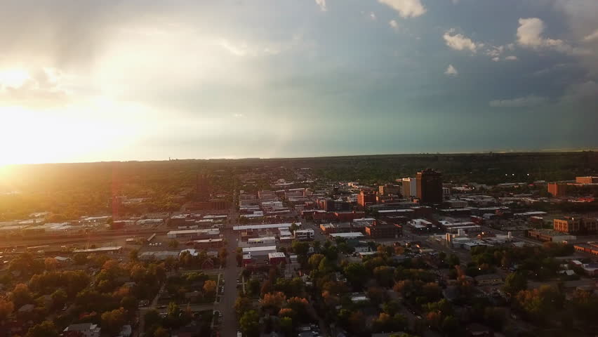 Aerial Panning Shot Of Buildings In City Against Sky At Sunset - Billings, Montana