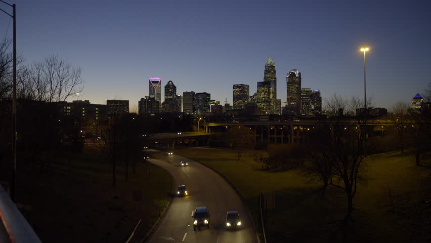 Lockdown Shot Of Vehicles On Road And Bridge In Illuminated City At Night - Charlotte, North Carolina