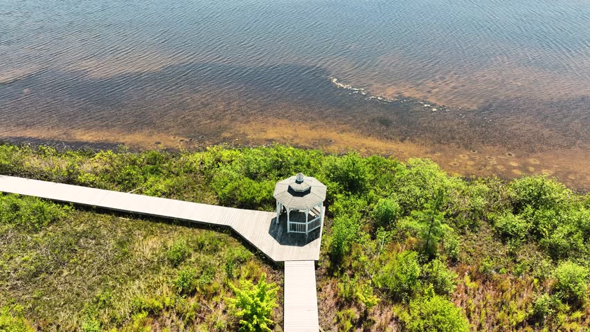 A small cute gazebo along the lakeshore of Little Black lake.