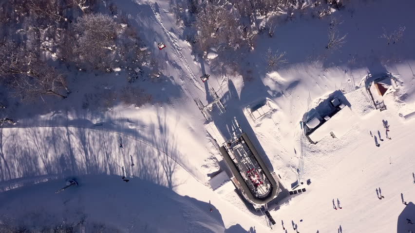 Aerial Top Down Shot of Gondola on Ski Hill in Chang Bai Shan, China