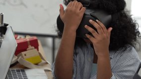 Kid exciting with VR goggles black african child have fun with education entertainment augment glasses - Powered by Shutterstock - Get 15% off with code: PIKWIZARD15