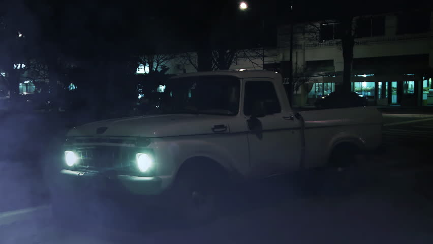 Old Pick Up Truck on a Street During a Misty Night in Buenos Aires Province, Argentina. 4K Resolution. Royalty-Free Stock Footage #1104677061