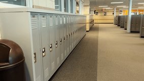 Wide shot of Lockers in the school hallway. Day time - Powered by Shutterstock - Get 15% off with code: PIKWIZARD15