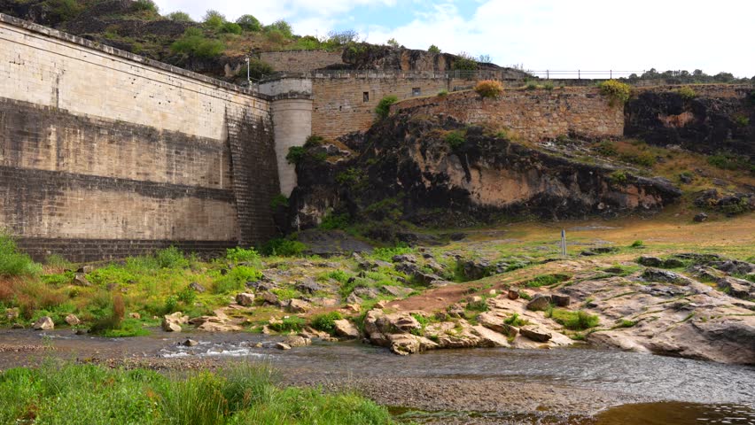Panning shot of Ponton de la Oliva dam built by prisioners from Carlists Wars