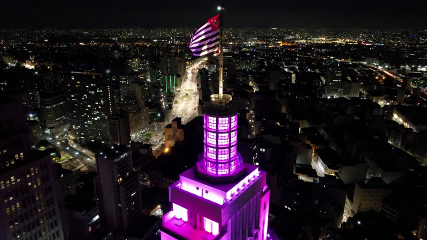 Santander Bank At Downtown Sao Paulo Brazil. Cityscape Aerial. Night Building Downtown Cityscape. Night Outdoors Downtown District High Angle View. Night Cityscape Santander Bank Building at Sao Paulo