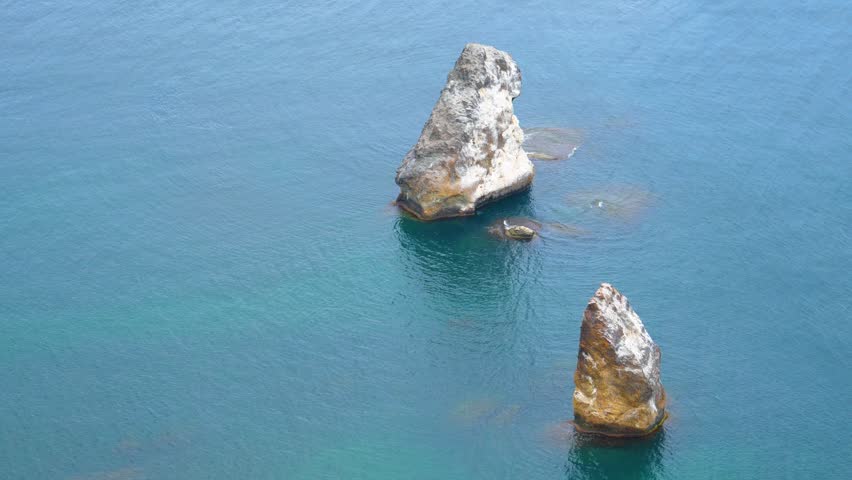 Large rocks in the sea, beautiful seascape. Rocks, sea, waves.