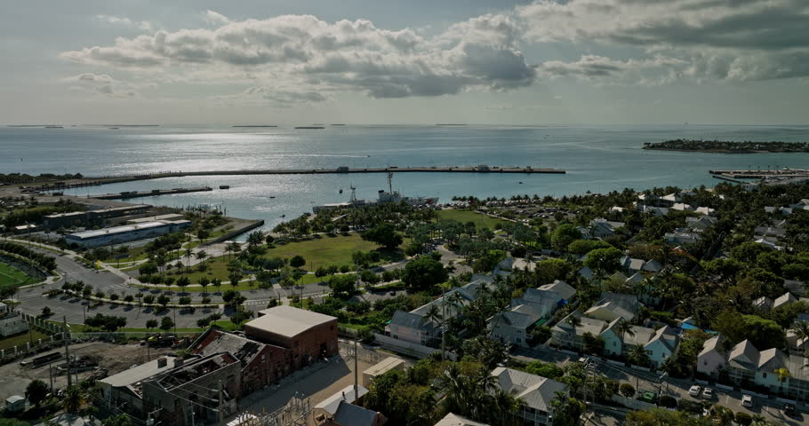 Key West Florida Aerial v20 drone flyover Truman Waterfront Park capturing USCGC Ingham maritime museum, Fort Zachary Taylor Cruise Pier and outdoor amphitheater - Shot with Mavic 3 Cine - April 2022