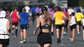 Female runner jog sport marathon. Woman athlete run long distance. Girl jogger work out urban public park. Sportswoman train body. Health city life concept. Fast run race slow motion. Active fit track - Powered by Shutterstock - Get 15% off with code: PIKWIZARD15