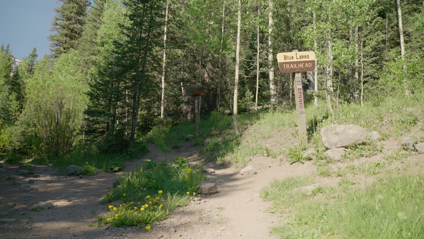 Man starting a hike at the trailhead | Blue Lakes Trail, Colorado