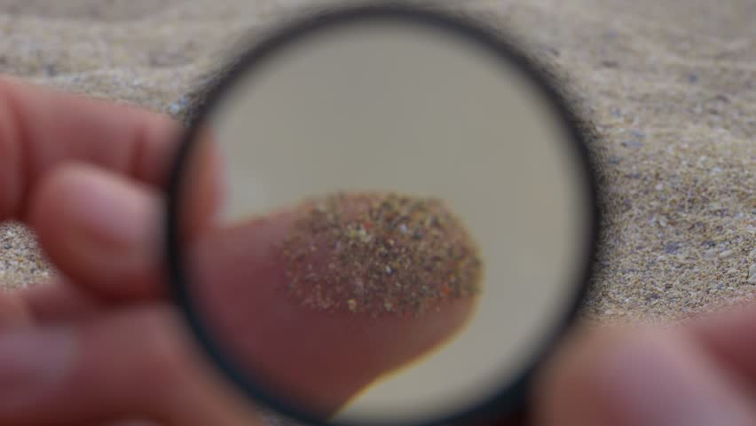 microplastic research, colorful plastic particles in sand close up view. Taking plastic samples onshore. Plastic waste on ocean beach. Environmental pollution, ecology, disaster Royalty-Free Stock Footage #1104700303