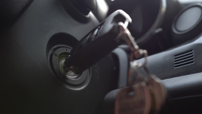Starting and Stopping Car Engine with Ignition Key Close Up Royalty-Free Stock Footage #1104703145