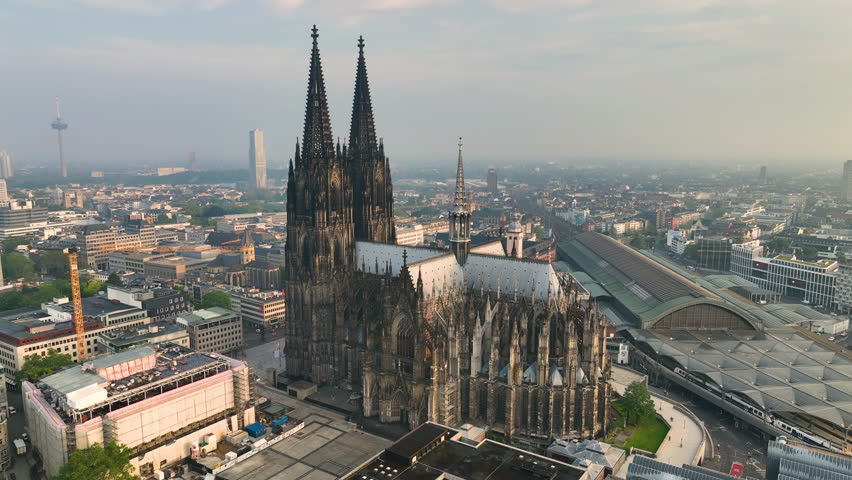 4k Aerial view of cityscape of Cologne, Germany, Europe. Cathedral Church of Saint Peter in historic city center