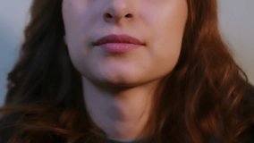 Caucasian Woman Applying Lip Balm, Then Smiling. Shot with ARRI Alexa in ArriRaw and exported QuickTime Apple ProRes 422 HQ. - Powered by Shutterstock - Get 15% off with code: PIKWIZARD15