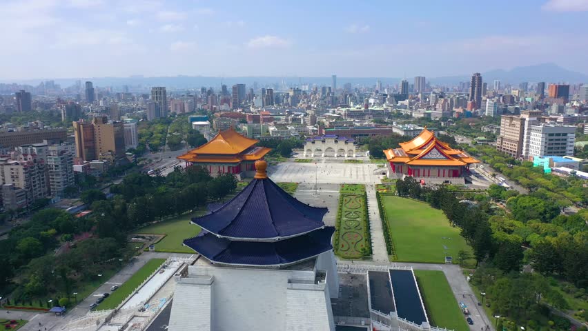 TAIWAN, TAIPEI - MAY, 2023: Aerial drone view of National Chiang Kai shek Memorial Hall in Taipei downtown, Memorial library on the Liberty square. Skyscrapers and high-rise buildings on background.