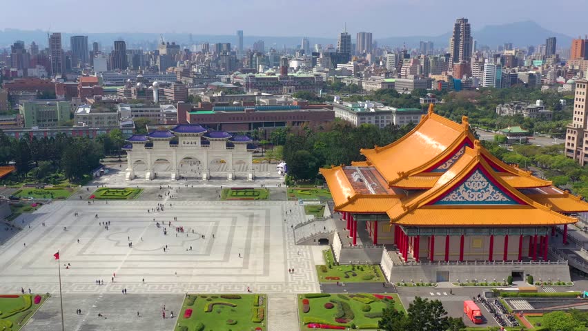 TAIWAN, TAIPEI - MAY, 2023: Aerial drone view of National Chiang Kai shek Memorial Hall in Taipei downtown, Memorial library on the Liberty square. Skyscrapers and high-rise buildings on background.