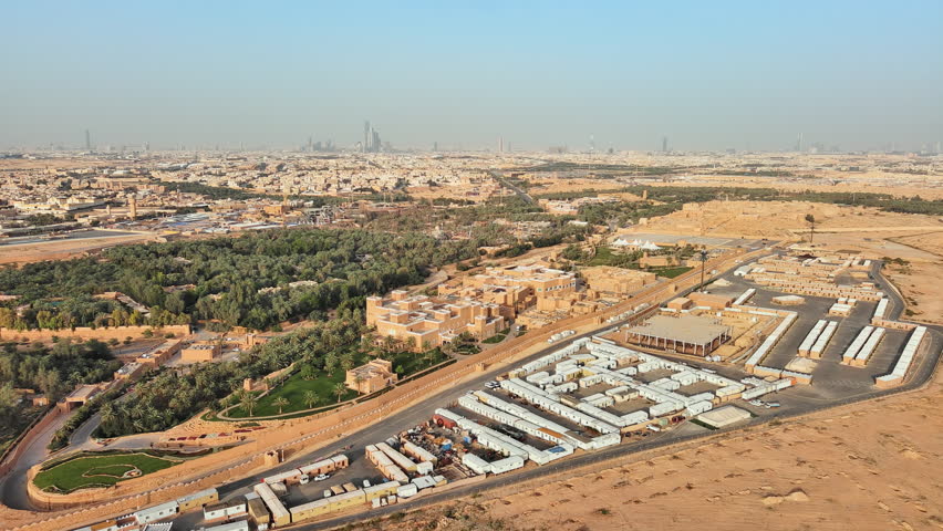 Riyadh, Al Diriyah: Aerial view of outskirts of capital city of Saudi Arabia - landscape panorama of Arabian Peninsula from above Royalty-Free Stock Footage #1104736675