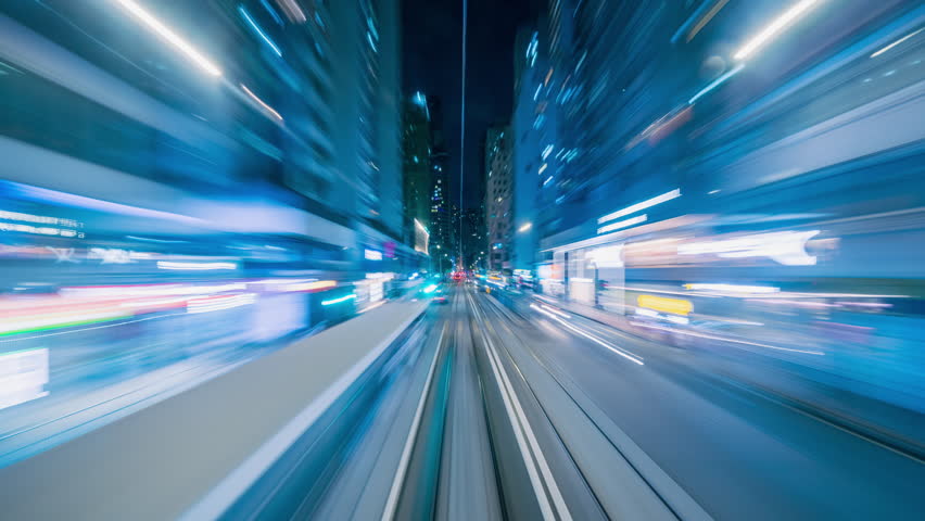 4K Hyperlapse motion blur of tram moving fast speed through street of Hong Kong downtown at night, China
 Royalty-Free Stock Footage #1104739565