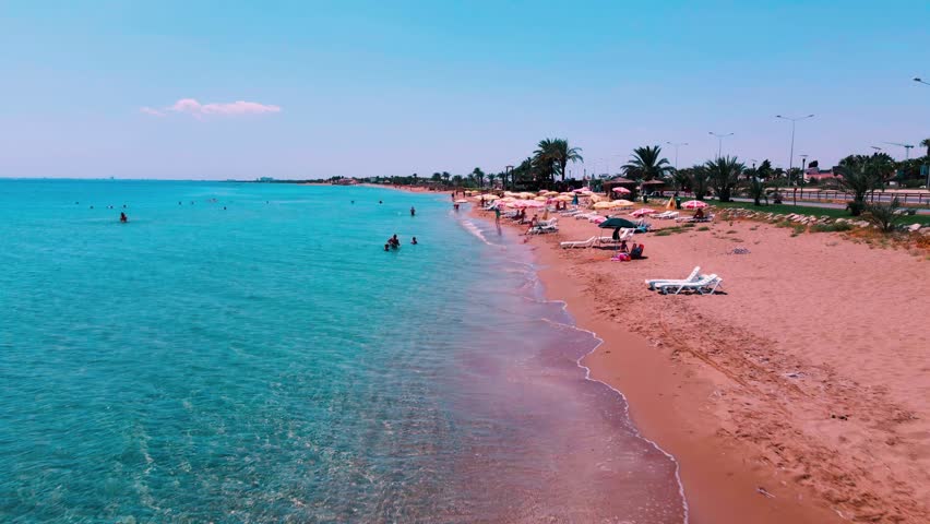 Long Beach in Iskele, North Cyprus on sunny day with clear sky