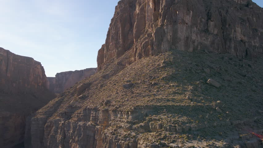 Aerial Drone View of Santa Elena Canyon Dramatic Landscape in in Big Bend National Park, Daylight Shot Over Blue Skyline, Low Angle