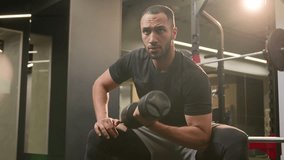 Bodybuilder African American man lifting dumbbell in gym healthy lifestyle fitness guy in sport club strength training exercise powerful workout strong athlete rowing with heavy weights strong arms - Powered by Shutterstock - Get 15% off with code: PIKWIZARD15