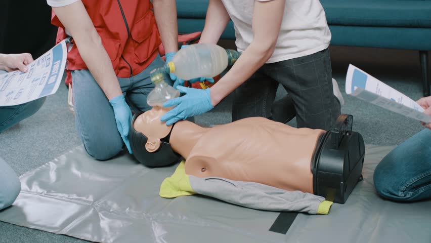 Adult CPR training and First Aid Instruction. First Aid Cardiopulmonary Resuscitation, How to do the CPR Technique Royalty-Free Stock Footage #1104745293