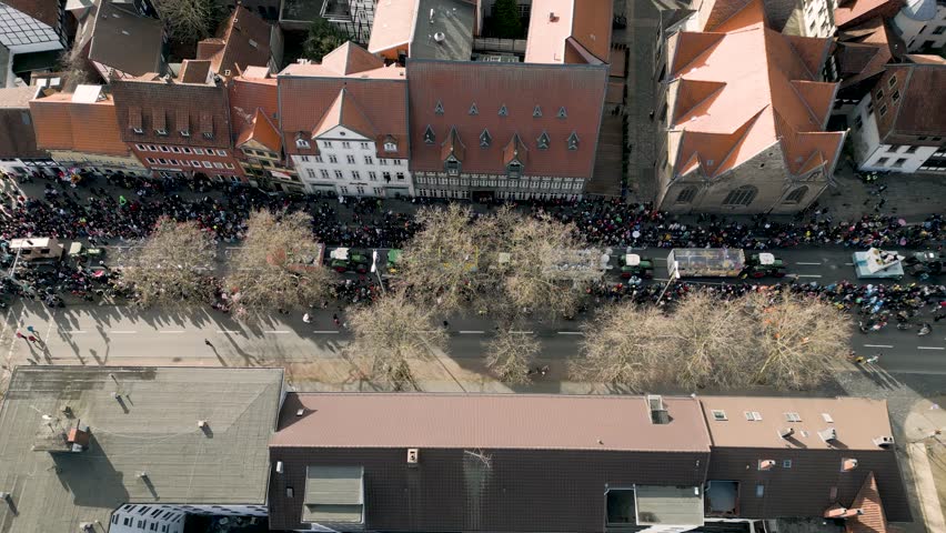 Aerial shot of the Brunswick Carnival floats on display with crowded streets