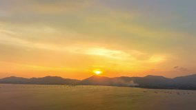 aerial hyperlapse view amazing colorful cloud in bright sky of sunset above the ocean. 
landscape amazing light of nature cloudscape bright sky above Phuket sea.
gradient color texture sky background