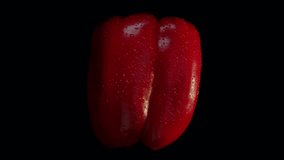 Freshly Washed Red Bell Pepper Rotating, Slow Motion. Shot with ARRI Alexa in ArriRaw at 120 fps, exported 23.98 fps QuickTime Apple ProRes 422 HQ. - Powered by Shutterstock - Get 15% off with code: PIKWIZARD15